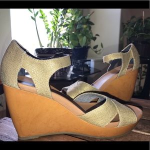Gold canvas sandal wedges.